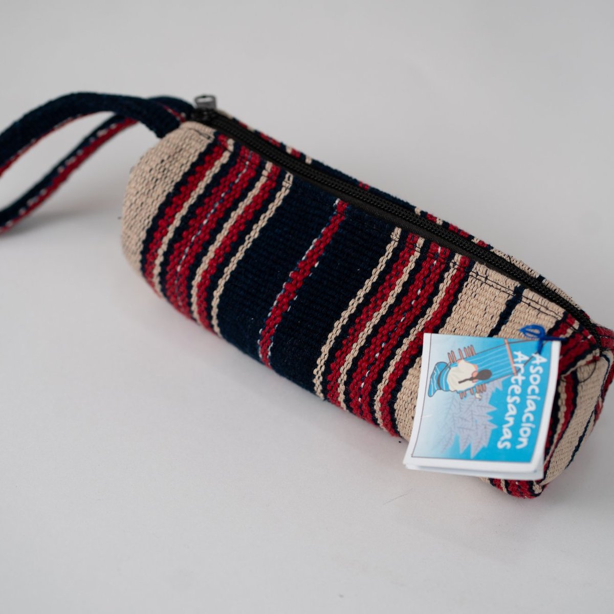 Estuche cilíndrico de rayas