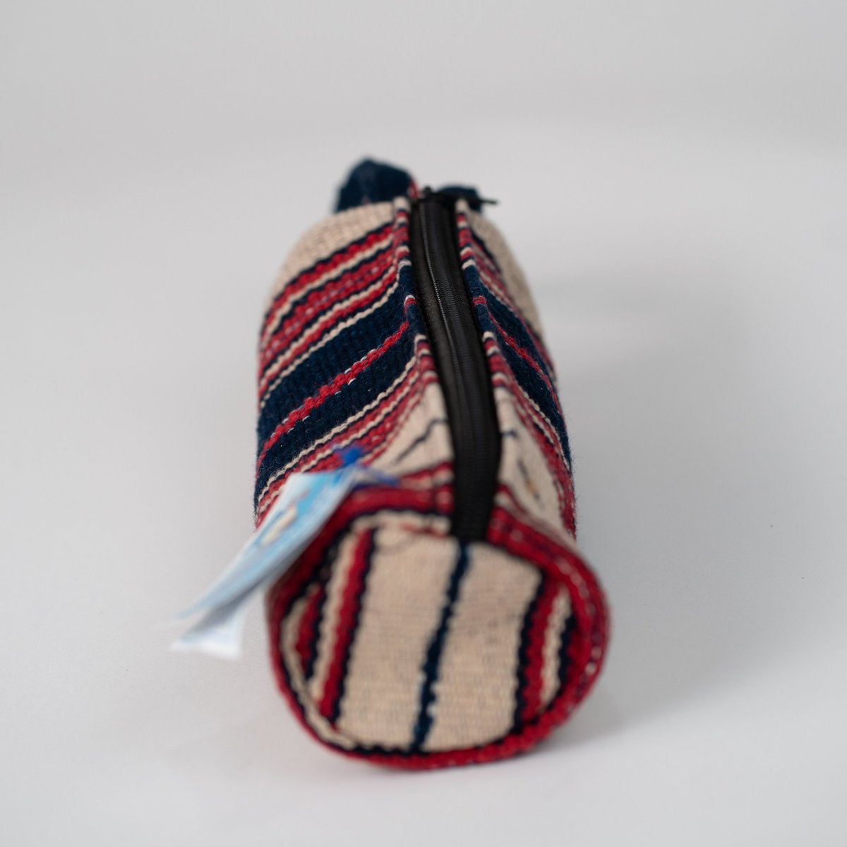 Estuche cilíndrico de rayas